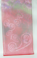 Load image into Gallery viewer, silk_chiffon_scarf_against_a_white_background_showing_the_white_spiral_design_and_the_red_pink_colours
