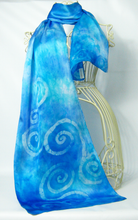Load image into Gallery viewer, A_pale_blue_silk_satin_scarf_with_a_Celtic_design_hand_painted_by_Louise_inspired_by_the_stone_carvings_found_at_Newgrange