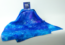 Load image into Gallery viewer, silk_scarf_made_locally_beautiful_blues_and_a_fine_wax_painting_of_a_Celtic_spiral_do_you_need_that_one_special_gift_maybe_a_Kris_kindle_gift_for_Christmas_this_scarf_could_be_the_thing_for_you