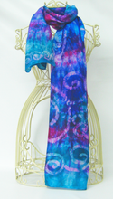 Load image into Gallery viewer, colourful_scarf_draped_over_a_wire_mannequinn_in_front_of_a_white_background_different_gift_idea_for_special_occasions