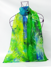 Load image into Gallery viewer, silk_scarf_with_blue_green_and_yellow_0n_wire_mannequin_against_a_white_backgraound