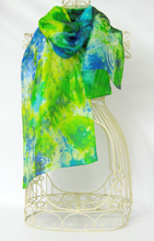 Load image into Gallery viewer, silk_shawl_hand_painted_by_Louise_Loughman_draped_over_a_mannequin_infront_of_a_white_bsckground_lovely_gift_idea_for_wedding_anniversaries