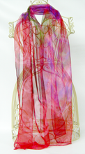 Load image into Gallery viewer, silk_scarf_with_celtic_pattern_in_reds_Pinks_violets_and_little_flashes_of_green
