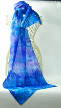 Load image into Gallery viewer, silk_scarf_in_bright_shades_of_blue_hand_painted_by_Louise_Loughman_a_batik_artist_based_in_County_Monaghan

