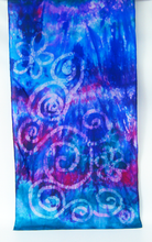 Load image into Gallery viewer, Colourful_silk_scarf_with_hand_painted_celtic_design_in-blues_green_and_magenta_in_front_of_a_white_background
