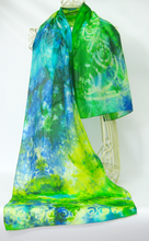 Load image into Gallery viewer, A_silk_scarf_hand_painted_by_Louise_in_shades_of_greens_lemon_yellow_and_bright_blue_a_lovely_gift_idea_for_retirements_super_silky_soft_dispalyed_infront_of_a_white_background
