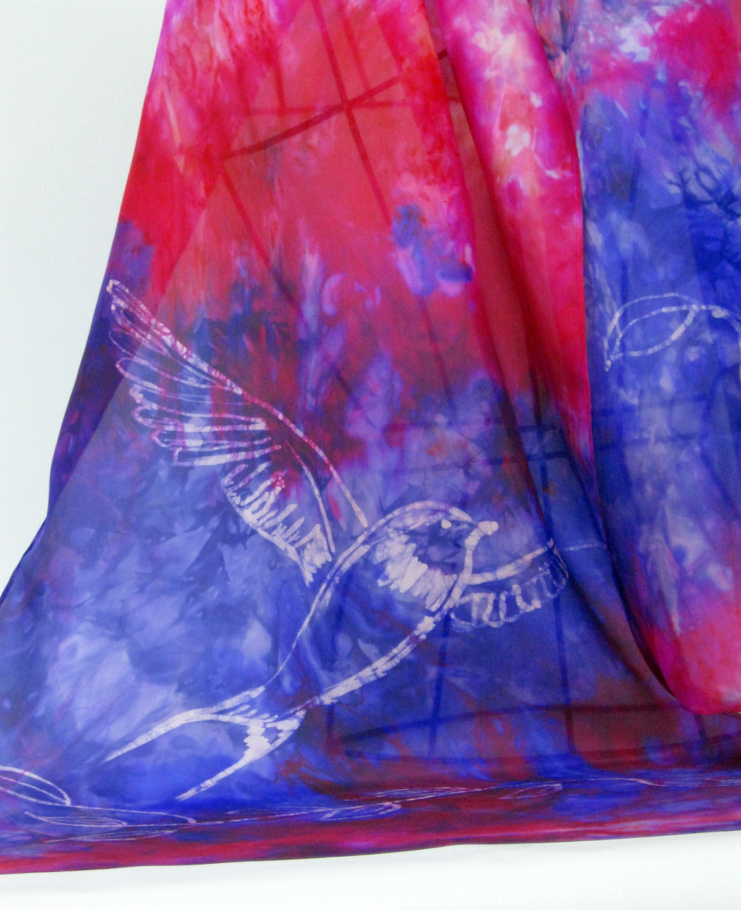 silk_scarf_with_wax_drawing_of_swallow_blues_and_pinks