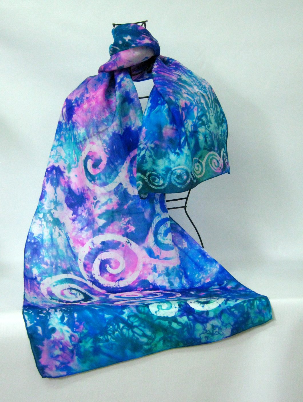 hand_painted _silk_scarf_with_celtic_spiral_design_in_blue_teal_and_pink