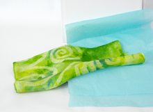 Load image into Gallery viewer, Celtic_silk_scarf_draped_on_box_with_tissue_paper
