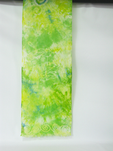 Load image into Gallery viewer, silk_scarf_in_subtle_shades_of_apple_green_with_a_delicate_fringe_on_the_bottom
