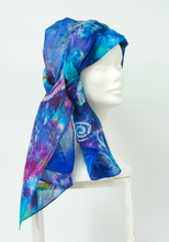 Load image into Gallery viewer, blue_scarf_with_a_hand_painted_spiral_design_done_in_the_art_of_batik_other_colours_include_magenta_and_bright_aqua
