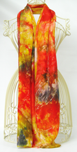 Load image into Gallery viewer, A-silk_scarf_hand_painted_in_autumnal_colours_golden_yellow_red_black_brown_silk_scarf_is_draped_over_a_wire_mannequin

