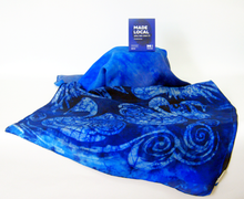 Load image into Gallery viewer, a_vibrant_silk_shawl_with_swan_design_infront_of_a_white_background_with_the_madelocal_tag_a_perfect_gift_idea_for_birthdays
