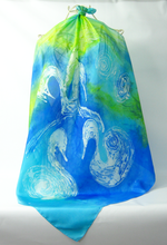 Load image into Gallery viewer, A_large_silk_square_scarf_that_tells_a_story_this_one_is_the_children_of_Lir_the_sorroful_celtic_tale_of_children_turned_into_swans_a_sad_but_beautiful_story
