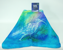 Load image into Gallery viewer, silk_square_scarf_with_hand_painted_drawing_of_a_curlew_draped_over_a_cube_infront_of_a_white_background_with_the_madelocal_sign
