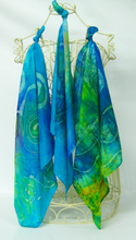 Load image into Gallery viewer, a_selection_of_lake_inspired_bandanas_in_shades-of_blended_green_turquoise_blue_and_yellow_bringing_the_feel_of_County_Monaghan_landscape_to_small_scarf
